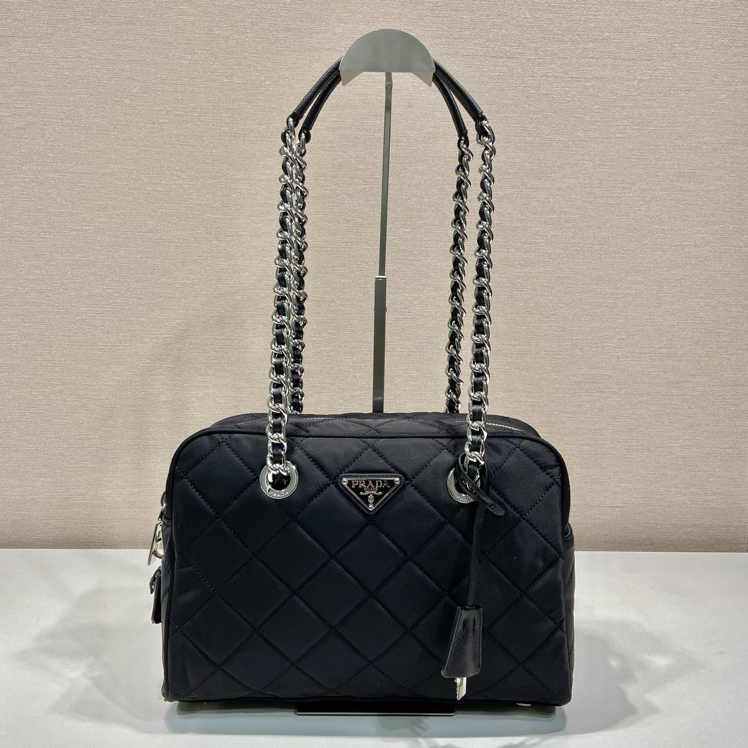 Pra*a top handle bags